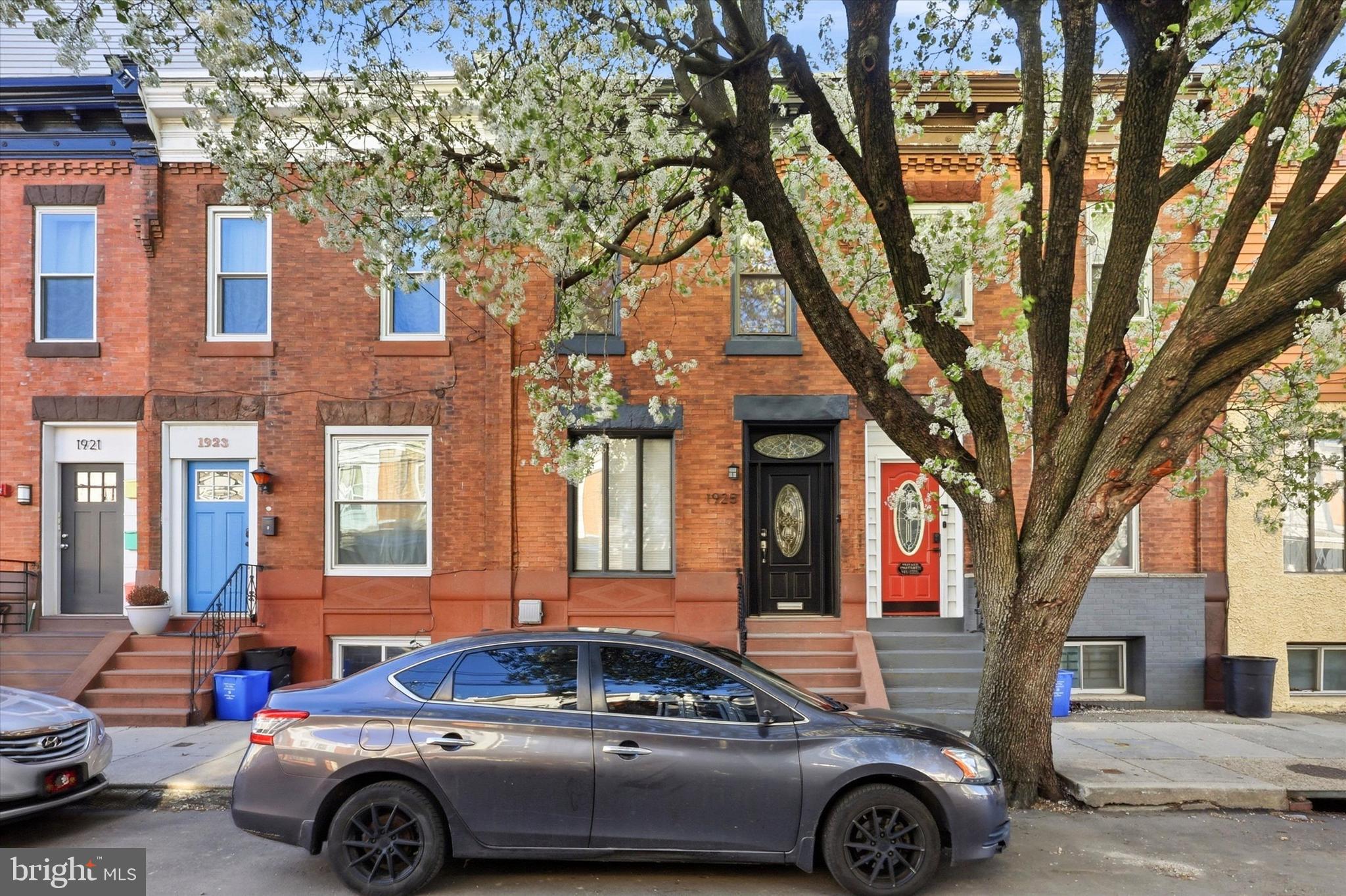 1925 South 21st Street Philadelphia, PA 19145 - Photo 1 of 15 a car parked in front of a houses