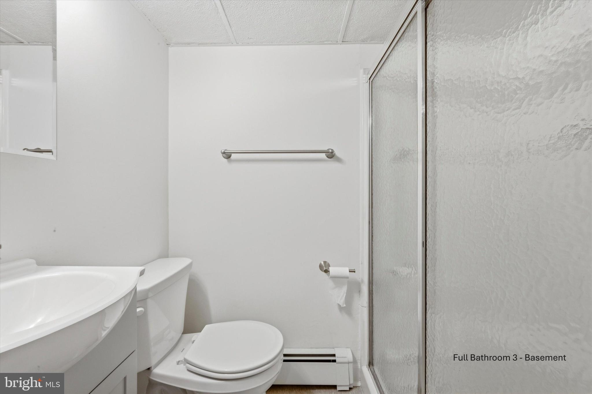 1925 South 21st Street Philadelphia, PA 19145 - Photo 15 of 15 a white toilet sitting next to a white bath tub