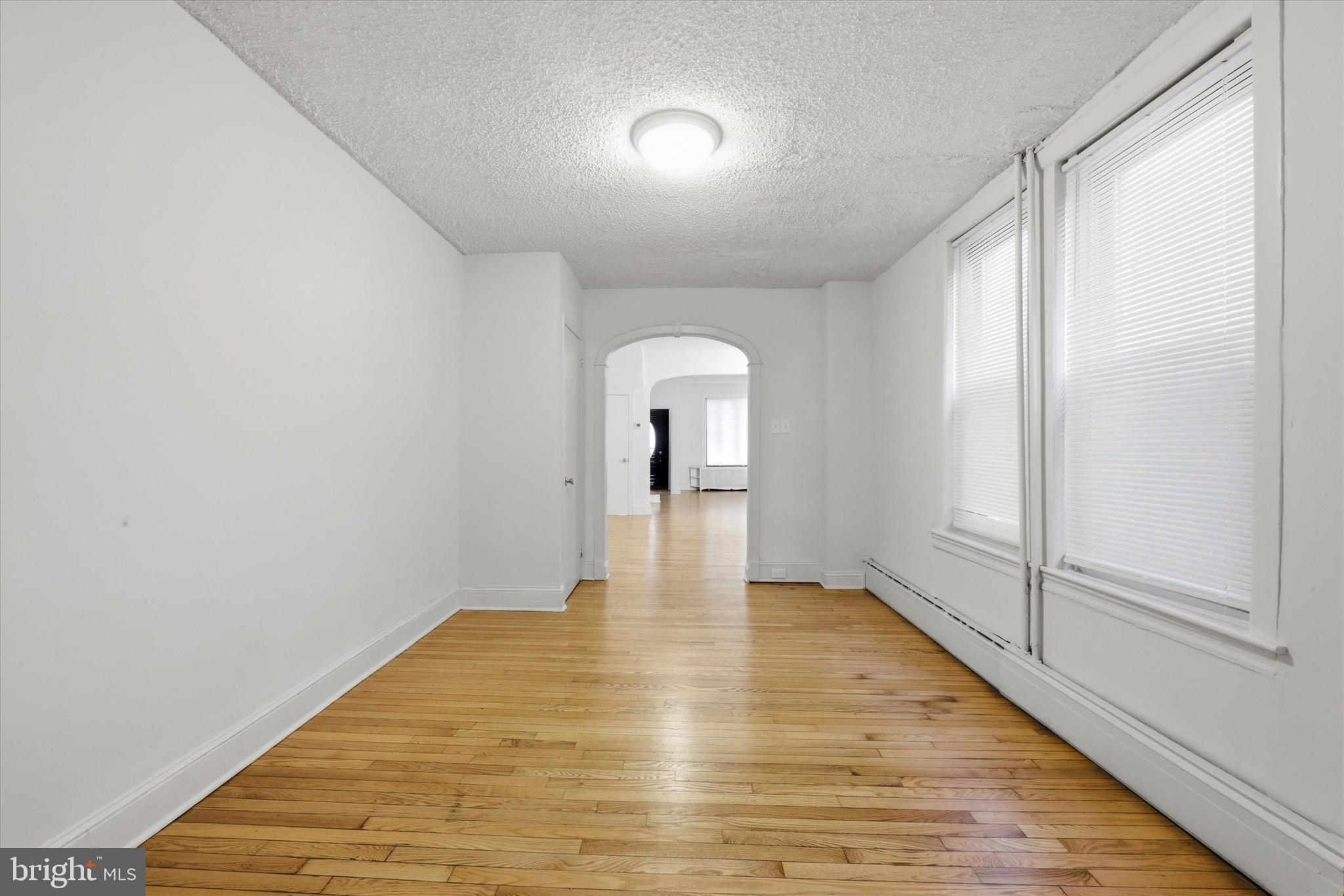 1925 South 21st Street Philadelphia, PA 19145 - Photo 5 of 15 a view of a room with wooden floor