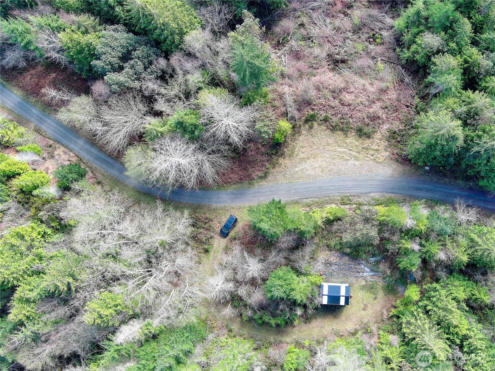1634 Sunrise Road Brinnon, WA 98320 - Photo 3 of 29 an aerial view of a house with a yard