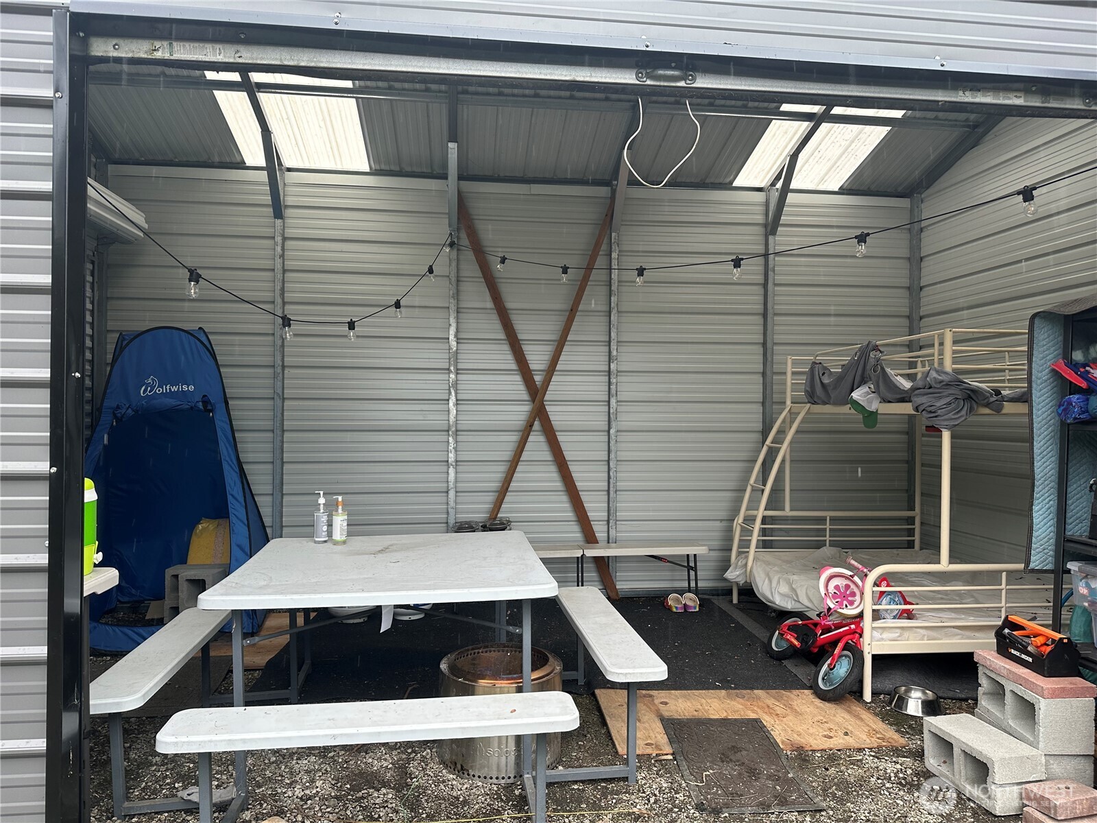 1634 Sunrise Road Brinnon, WA 98320 - Photo 7 of 29 a picture of a couch in the balcony