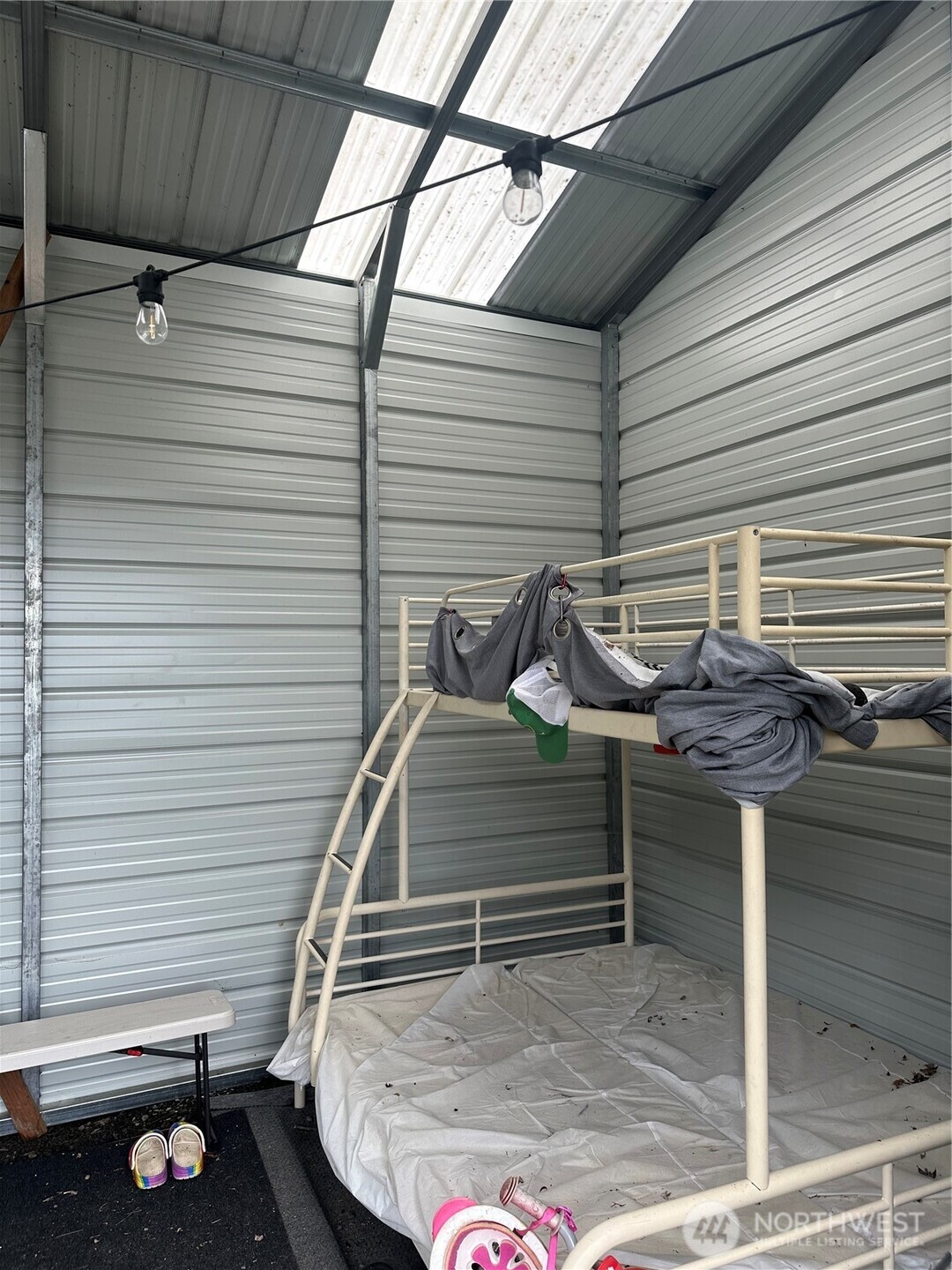 1634 Sunrise Road Brinnon, WA 98320 - Photo 9 of 29 a view of a patio with table and chairs