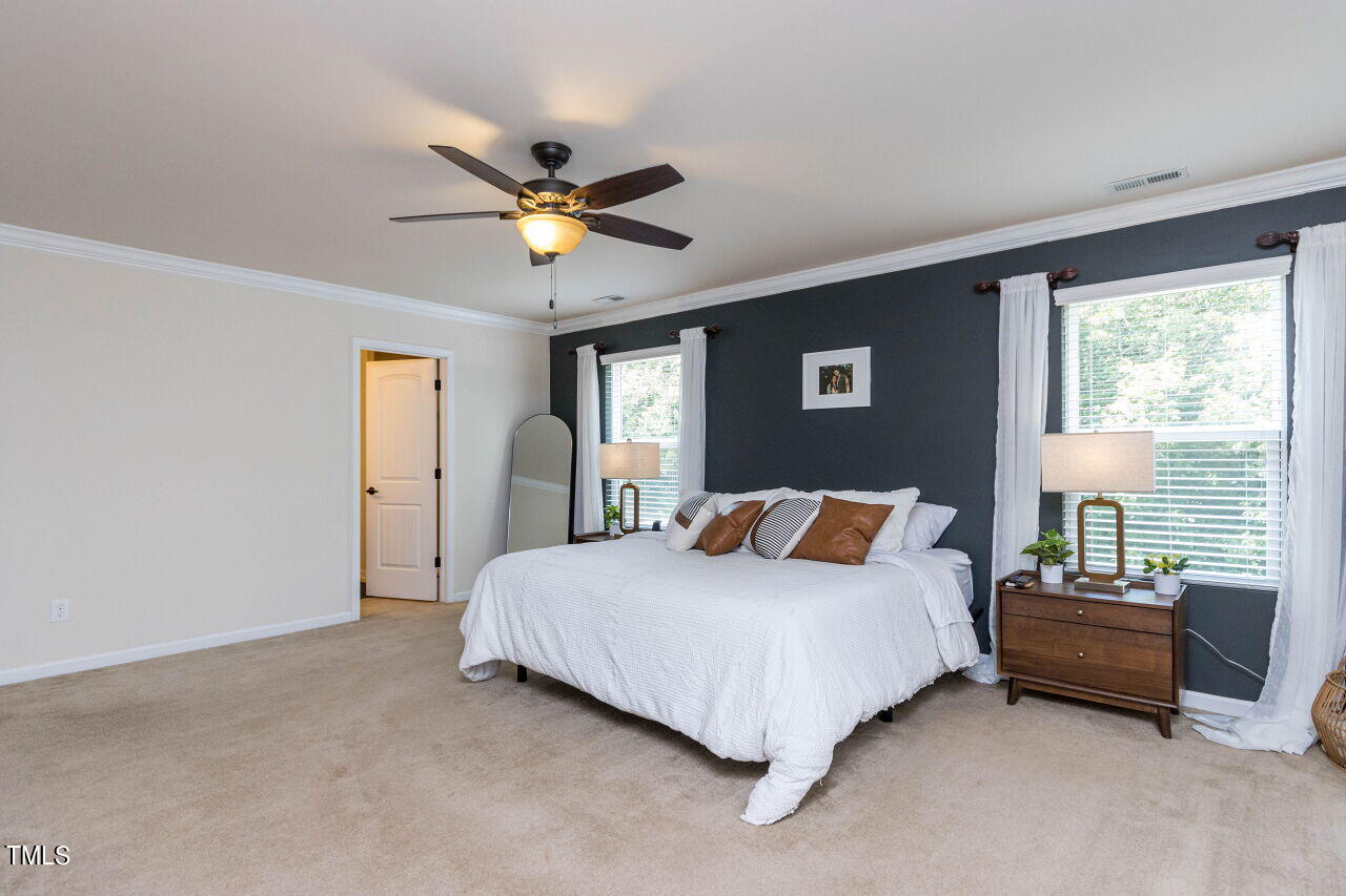 3464 Althorp Drive Raleigh, NC 27616 - Photo 15 of 32 Oversized Primary Suite with a trendy accent wall