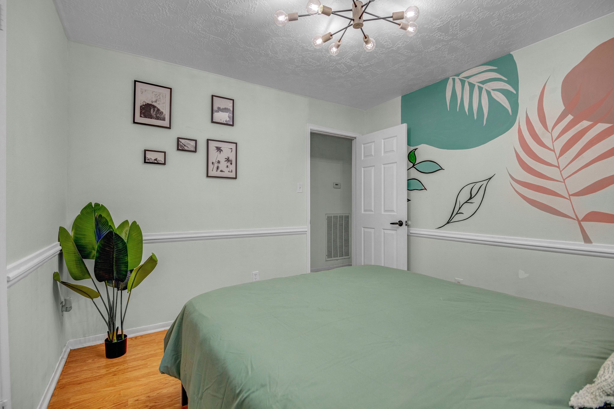 8222 Viny Ridge Drive Houston, TX 77083 - Photo 15 of 34 a bedroom with a bed and ceiling fan