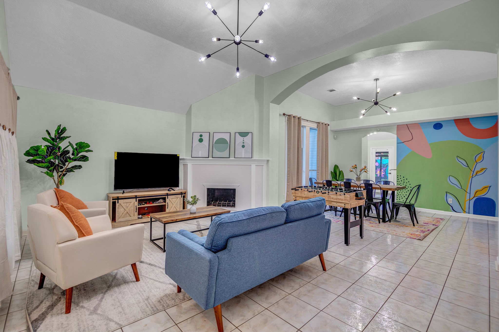 8222 Viny Ridge Drive Houston, TX 77083 - Photo 2 of 34 a living room with furniture a dining table and a potted plant