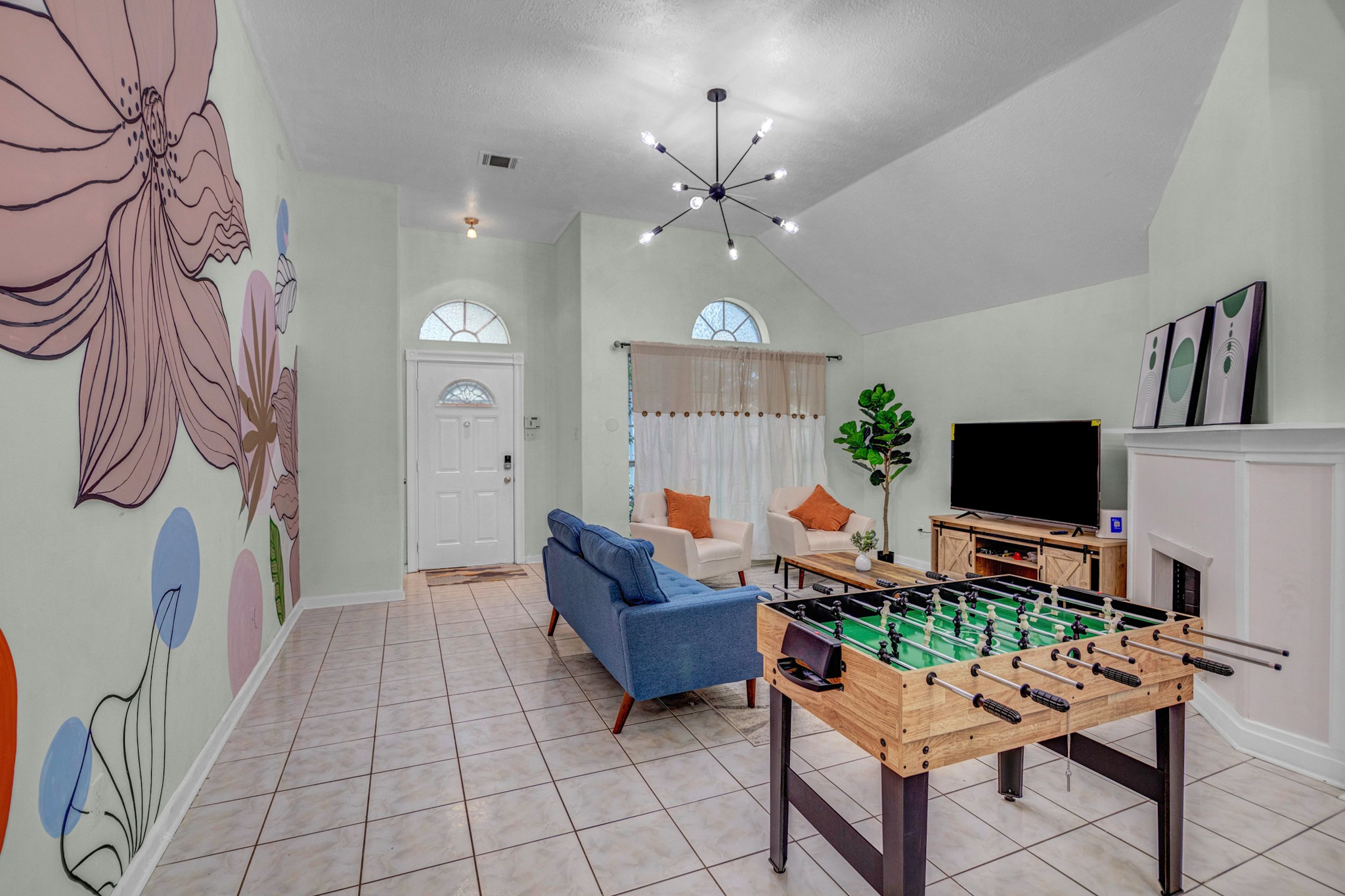 8222 Viny Ridge Drive Houston, TX 77083 - Photo 3 of 34 a living room with furniture and a flat screen tv