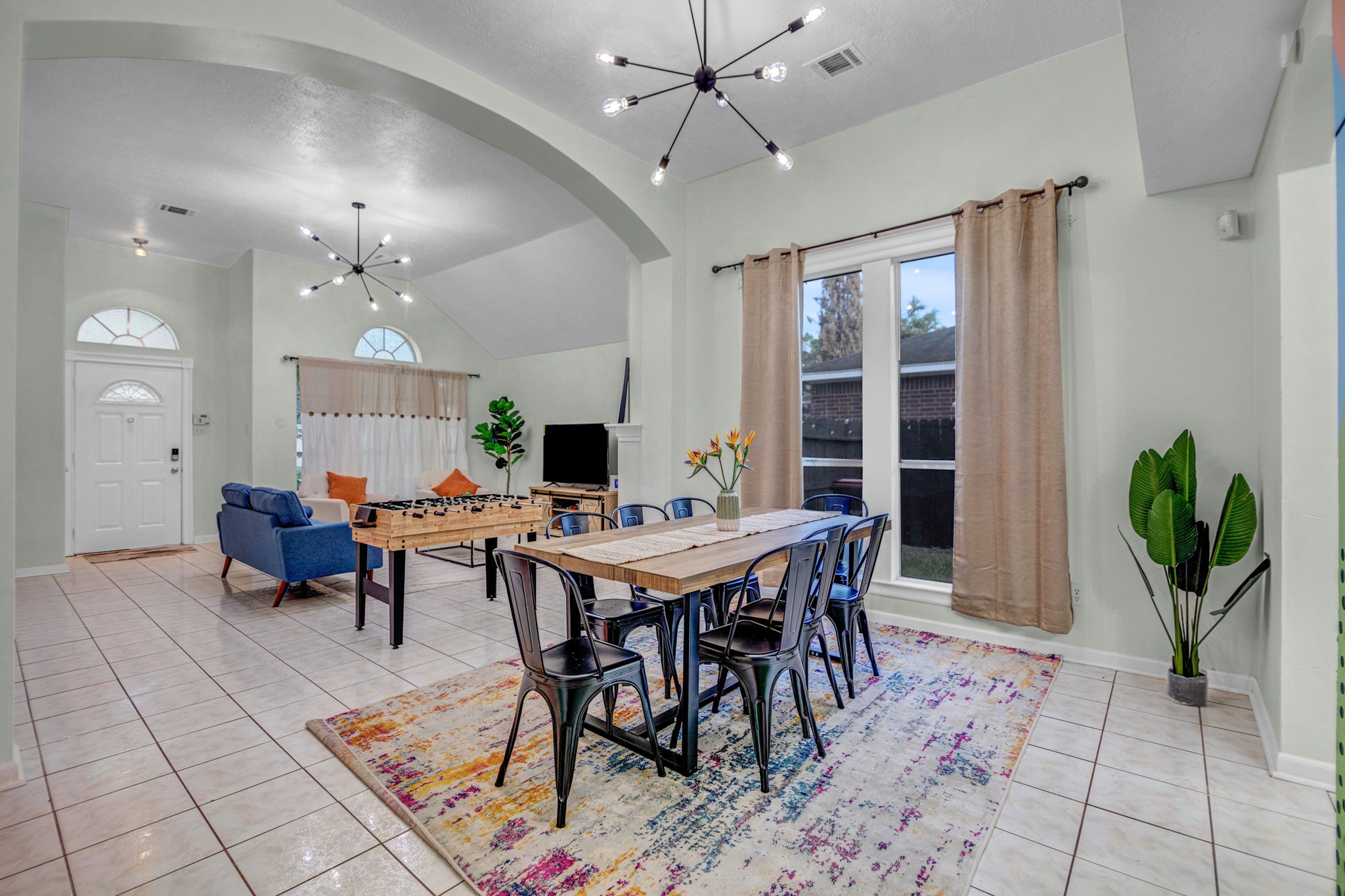 8222 Viny Ridge Drive Houston, TX 77083 - Photo 4 of 34 a view of a dining room with furniture
