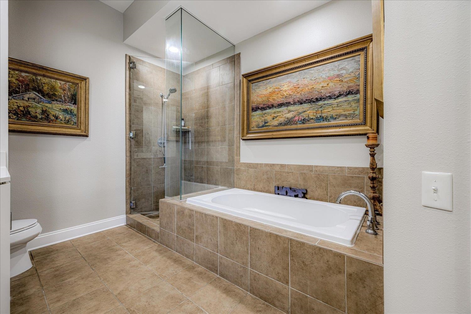 717 Riverside Drive, Unit 207 Memphis, TN 38103 - Photo 23 of 30 a bathroom with a sink and a mirror