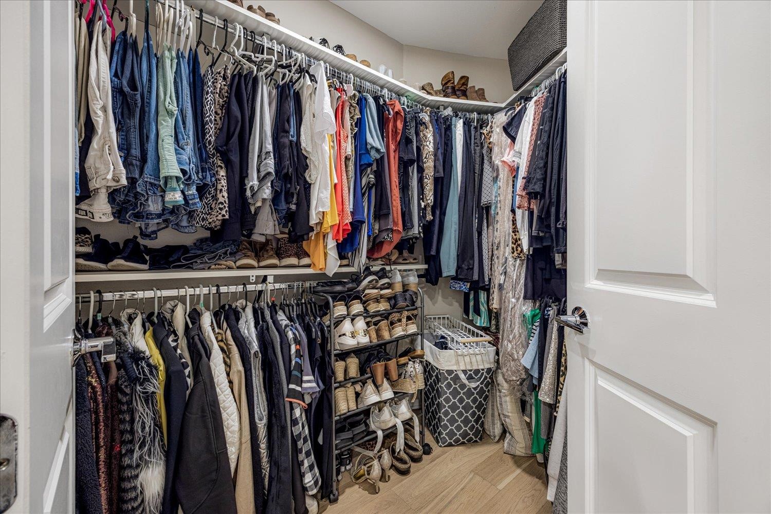 717 Riverside Drive, Unit 207 Memphis, TN 38103 - Photo 25 of 30 a view of walk in closet with clothes