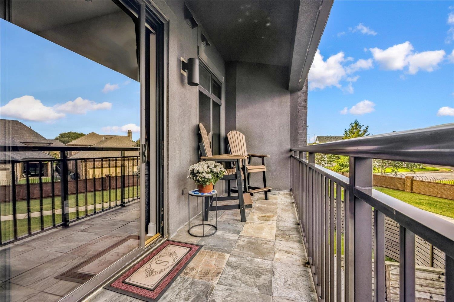 717 Riverside Drive, Unit 207 Memphis, TN 38103 - Photo 27 of 30 a view of balcony with wooden floor and furniture