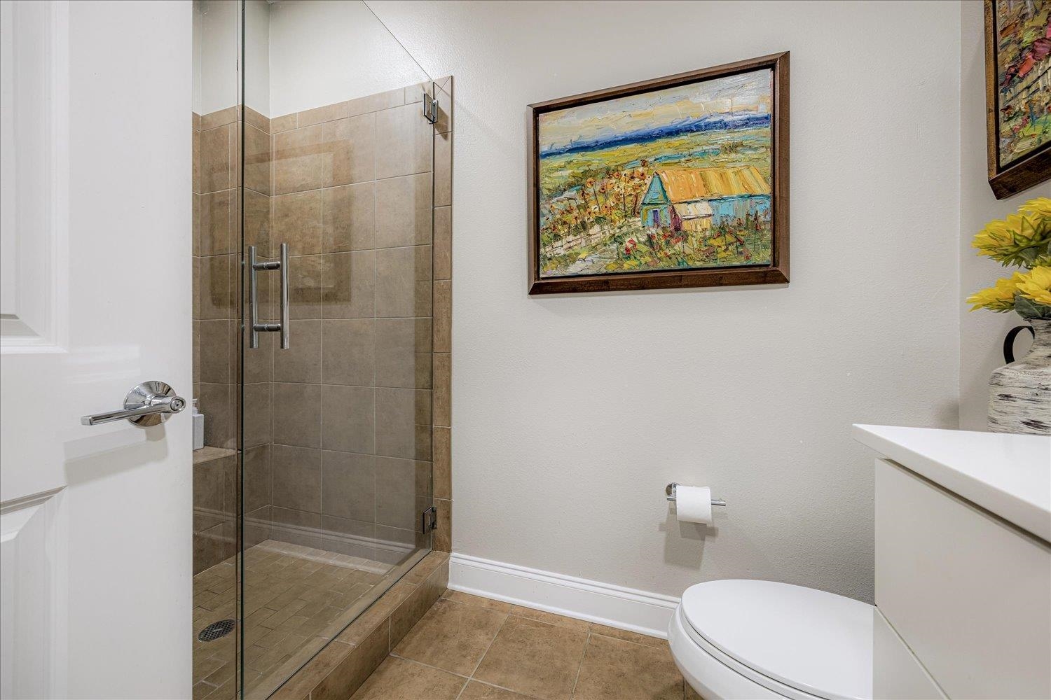 717 Riverside Drive, Unit 207 Memphis, TN 38103 - Photo 7 of 30 a bathroom with a shower and a toilet