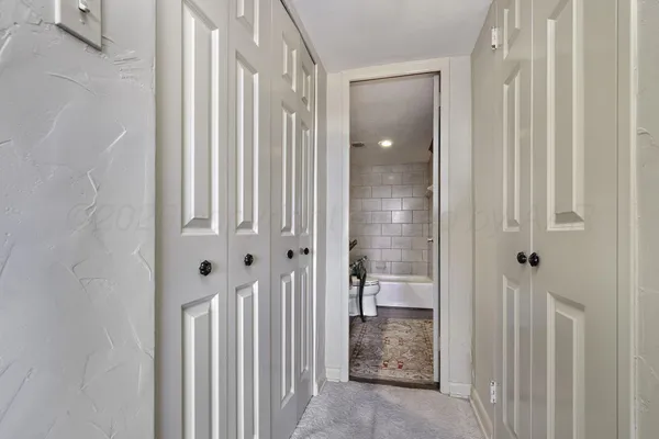 a bathroom with a bathtub a sink and a toilet