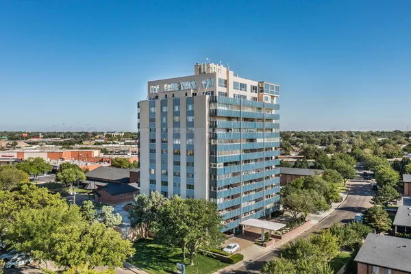 a view of a city with tall buildings