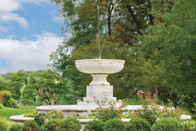 a view of a storage and utility room with washer and dryer