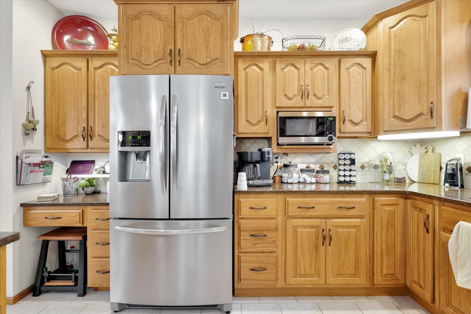 3002 Country Bend Lane Champaign, IL 61822 - Photo 11 of 48 a white refrigerator freezer sitting in a kitchen