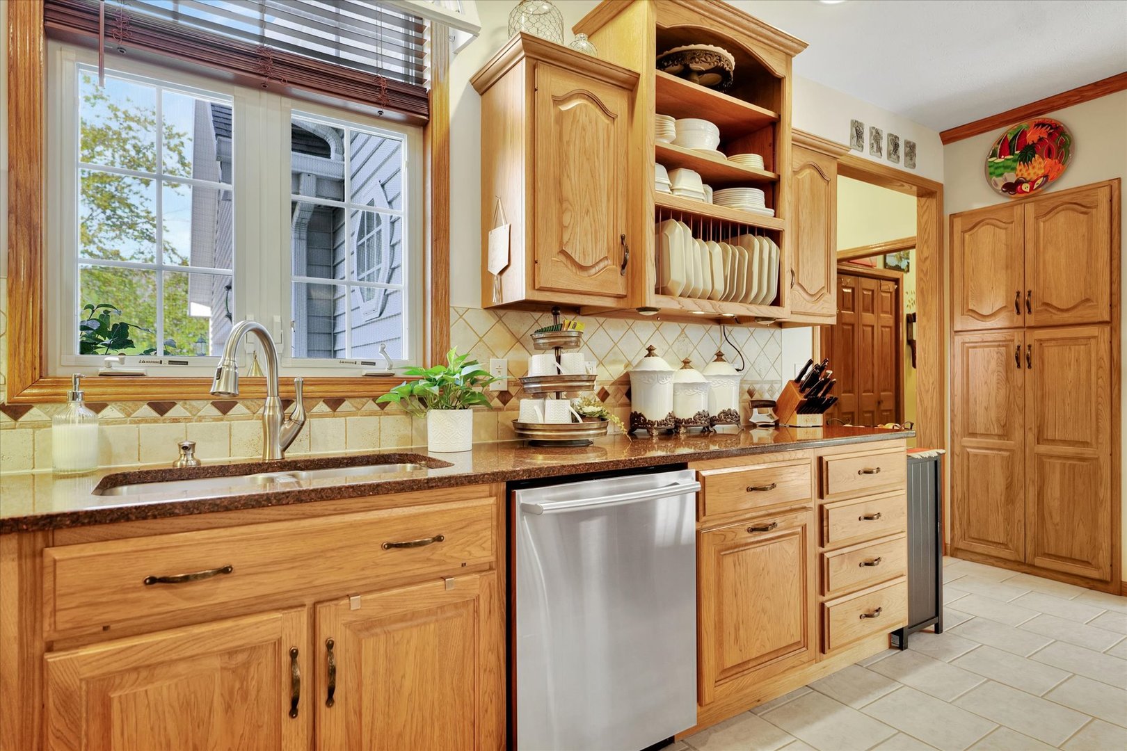 3002 Country Bend Lane Champaign, IL 61822 - Photo 13 of 48 a kitchen with cabinets and wooden floor