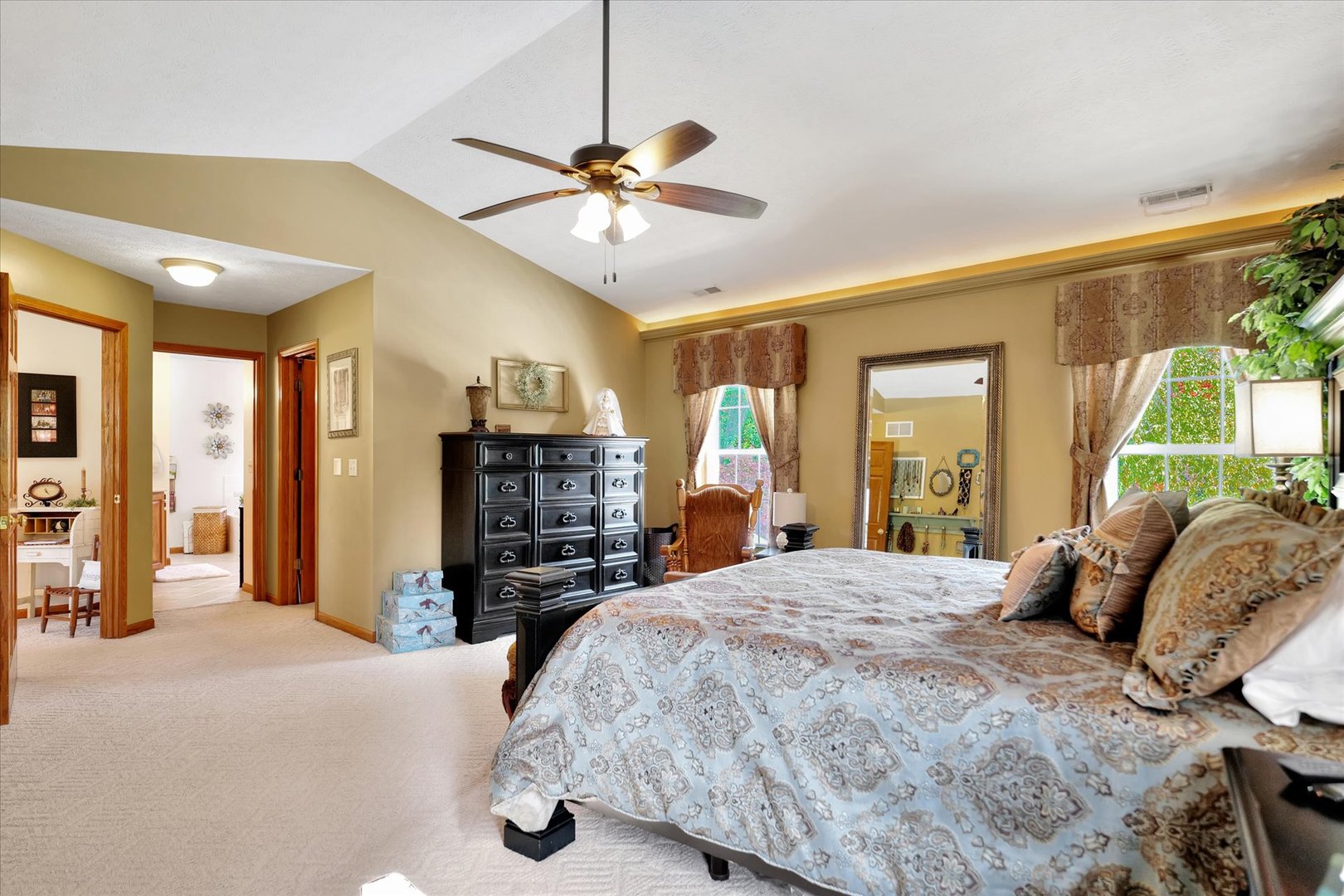 3002 Country Bend Lane Champaign, IL 61822 - Photo 27 of 48 a bedroom with a large bed and a chandelier