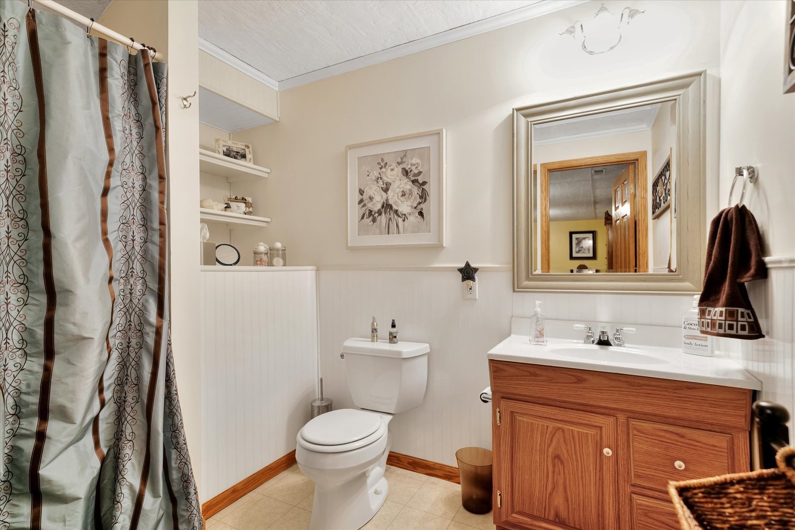 3002 Country Bend Lane Champaign, IL 61822 - Photo 37 of 48 a bathroom with a toilet sink and mirror