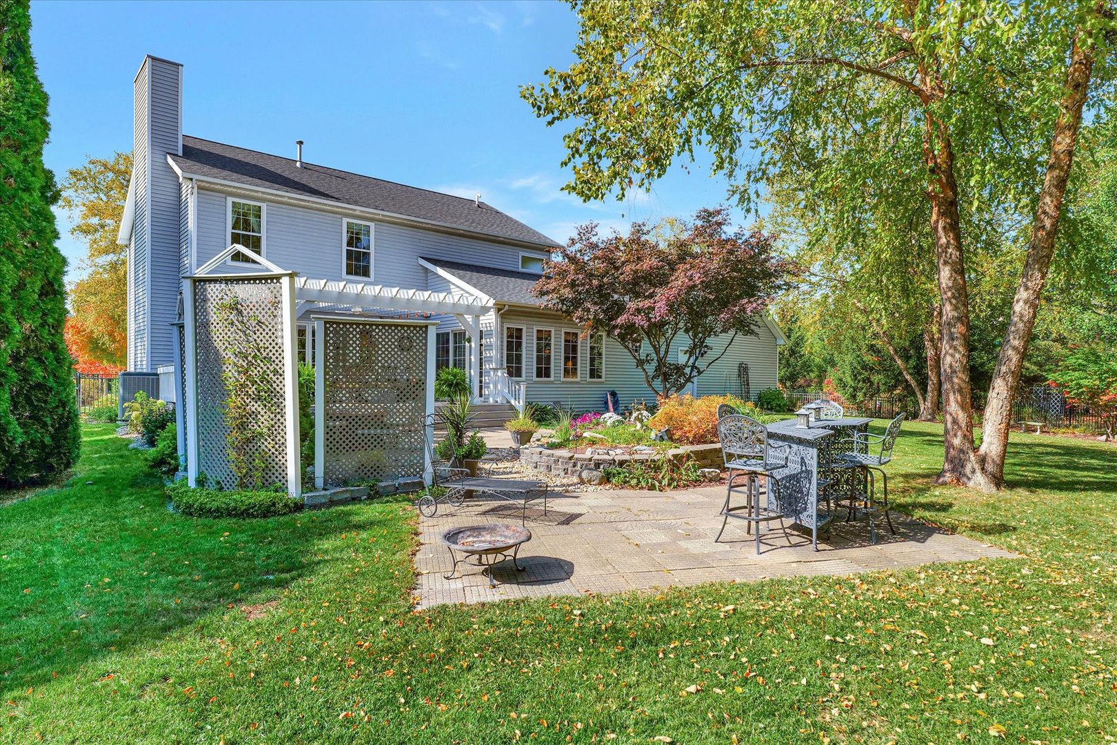 3002 Country Bend Lane Champaign, IL 61822 - Photo 43 of 48 a view of a house with backyard porch and sitting area
