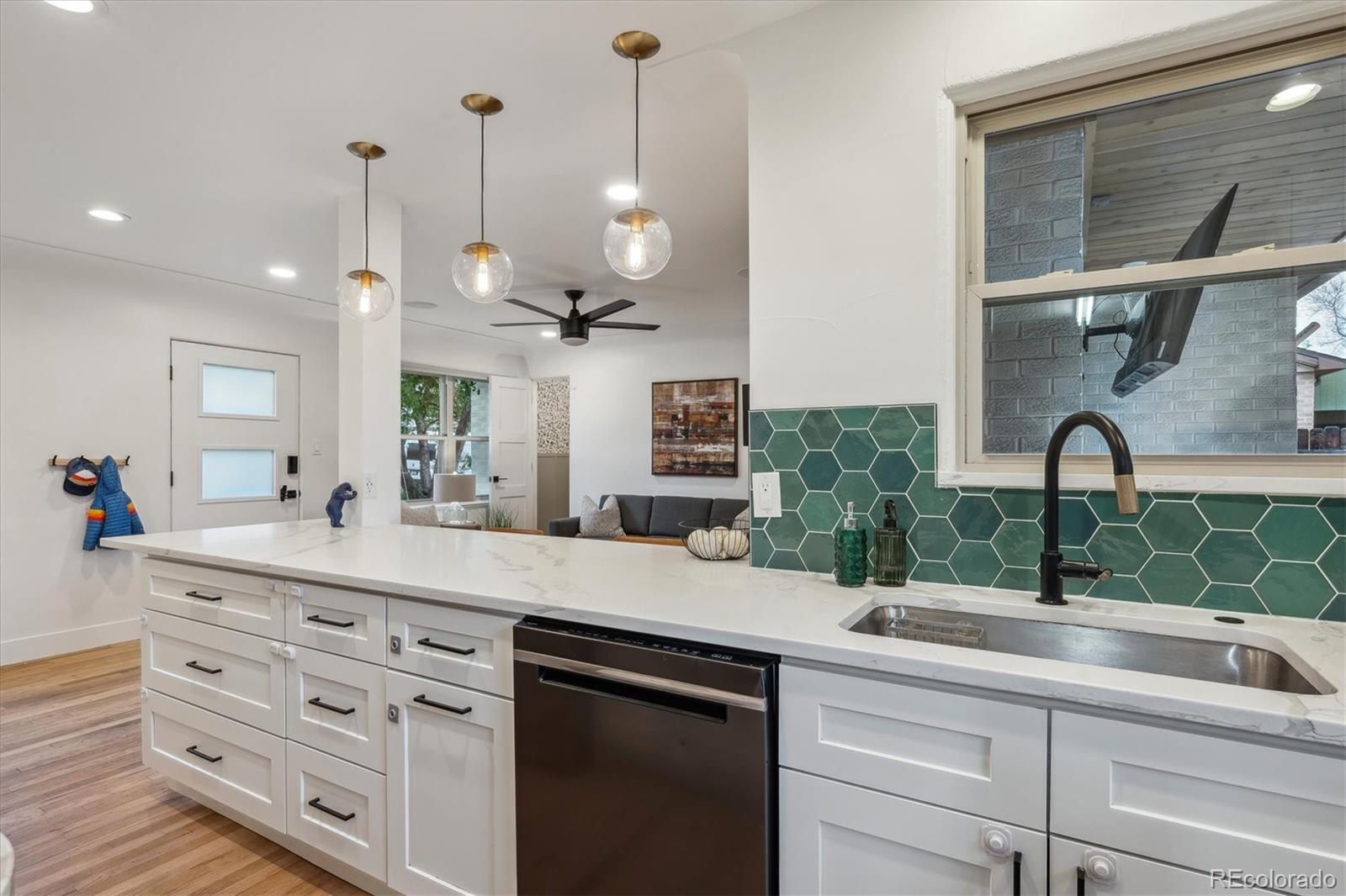 3200 Ames Street Wheat Ridge, CO 80212 - Photo 23 of 46 a kitchen with counter top appliance and window
