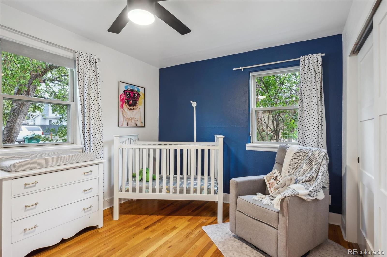 3200 Ames Street Wheat Ridge, CO 80212 - Photo 29 of 46 a bedroom with a bed and a window