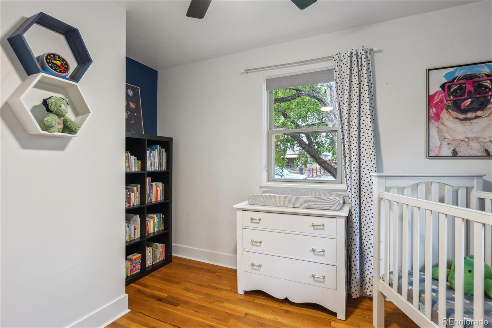 3200 Ames Street Wheat Ridge, CO 80212 - Photo 30 of 46 a view of bedroom with furniture and window