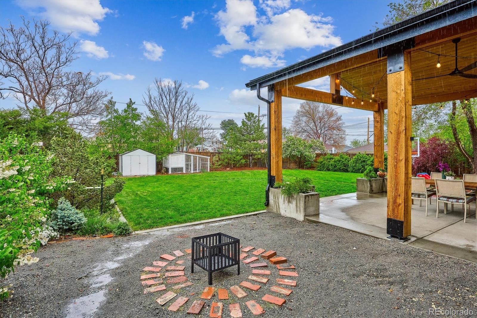 3200 Ames Street Wheat Ridge, CO 80212 - Photo 35 of 46 a front view of a house with garden