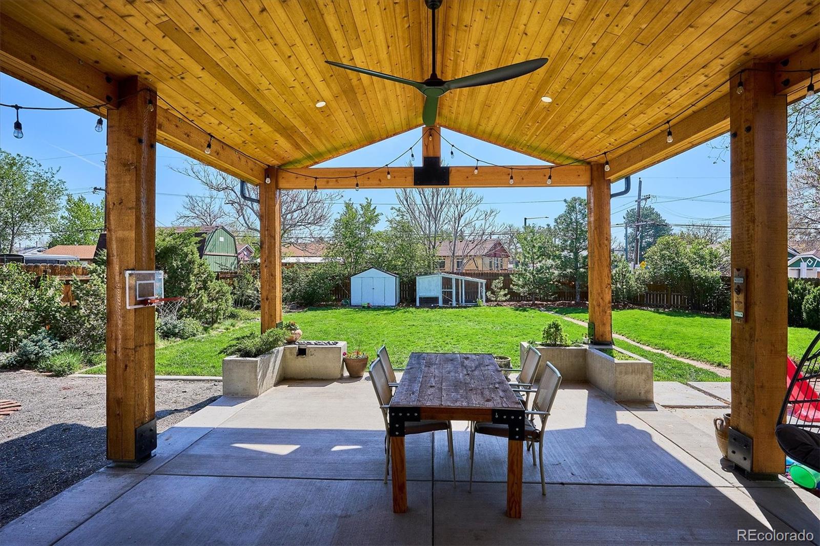 3200 Ames Street Wheat Ridge, CO 80212 - Photo 39 of 46 a view of an outdoor sitting area with furniture and backyard