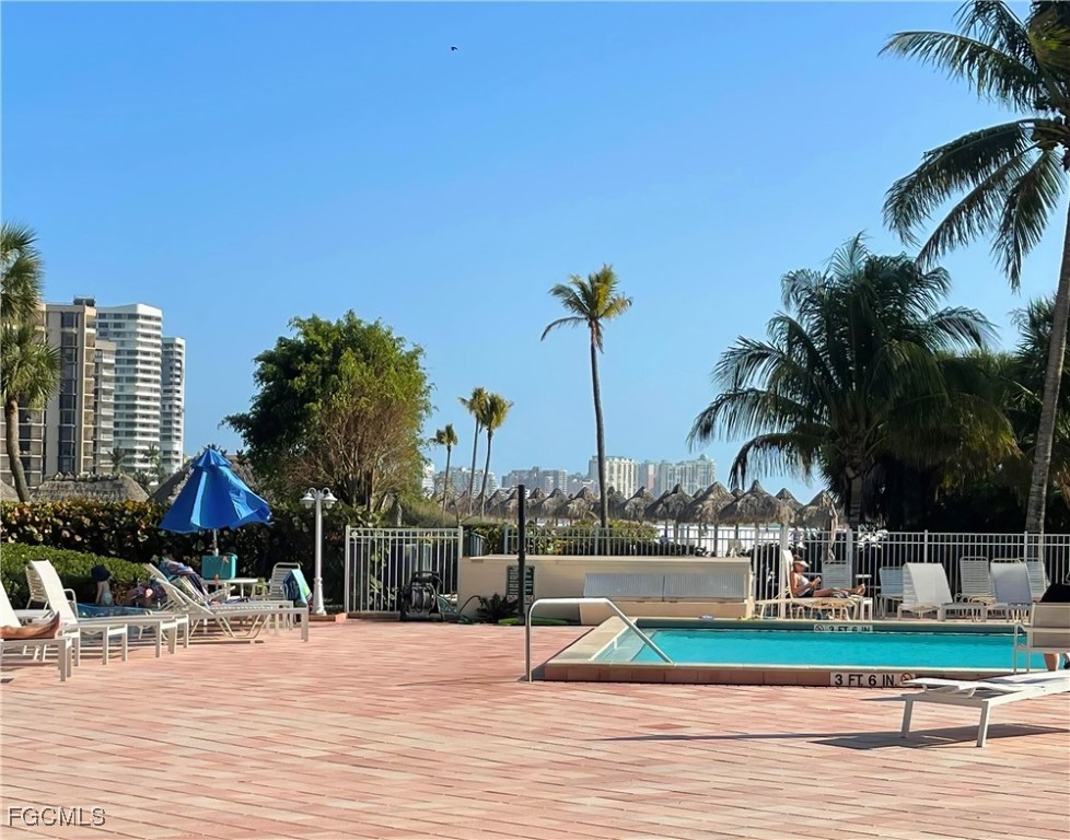 58 North Collier Boulevard, Unit 2010 Marco Island, FL 34145 - Photo 35 of 48 a view of lake with palm trees