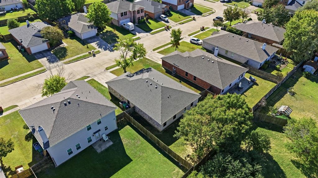 8704 Serenity Way Denton, TX 76210 - Photo 19 of 29 an aerial view of a house