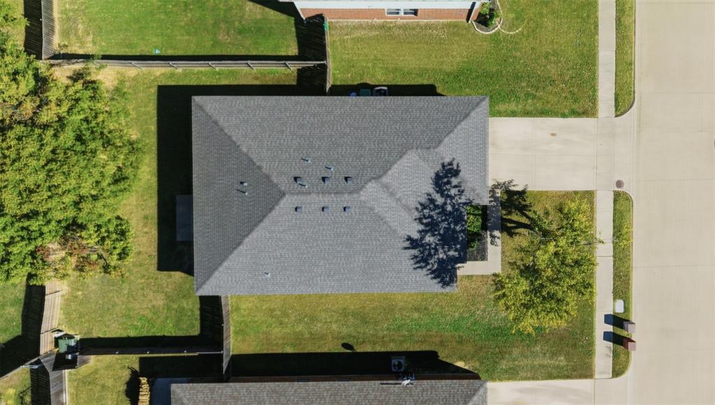 8704 Serenity Way Denton, TX 76210 - Photo 20 of 29 an aerial view of a residential houses with outdoor space