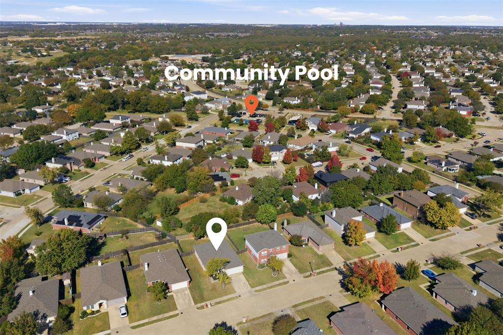 8704 Serenity Way Denton, TX 76210 - Photo 28 of 29 an aerial view of residential houses with city view