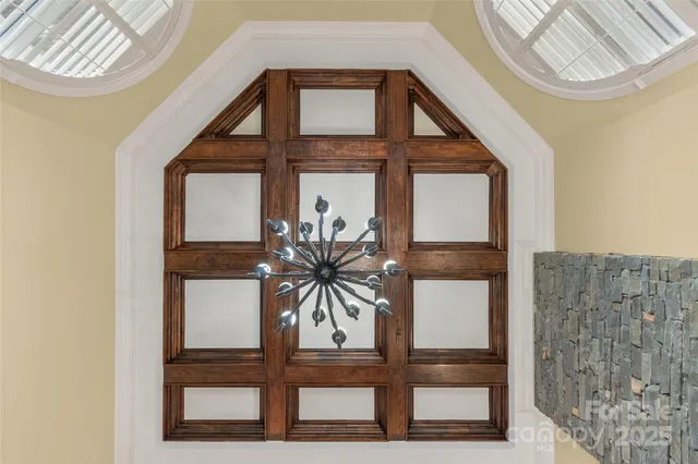 a living room with furniture and fireplace