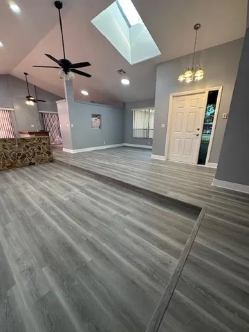 a view of a room with a flat screen tv