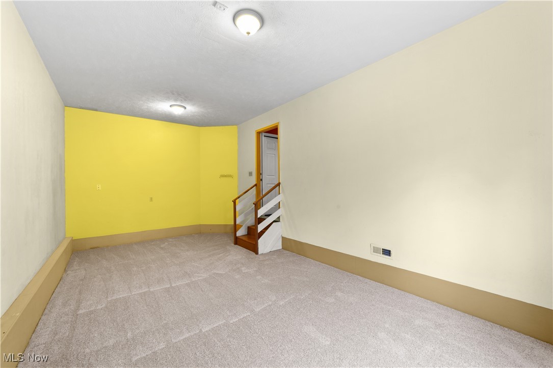 1802 Spring Road Cleveland, OH 44109 - Photo 15 of 40 View of carpeted empty room