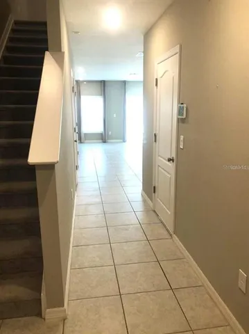 a kitchen with a sink stove and microwave