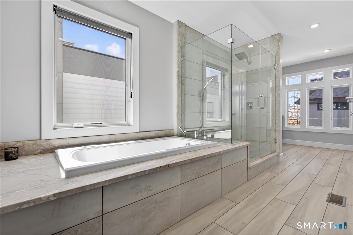 33 Pearl Street Milford, CT 06460 - Photo 23 of 40 a bathroom with a granite countertop sink mirror and double