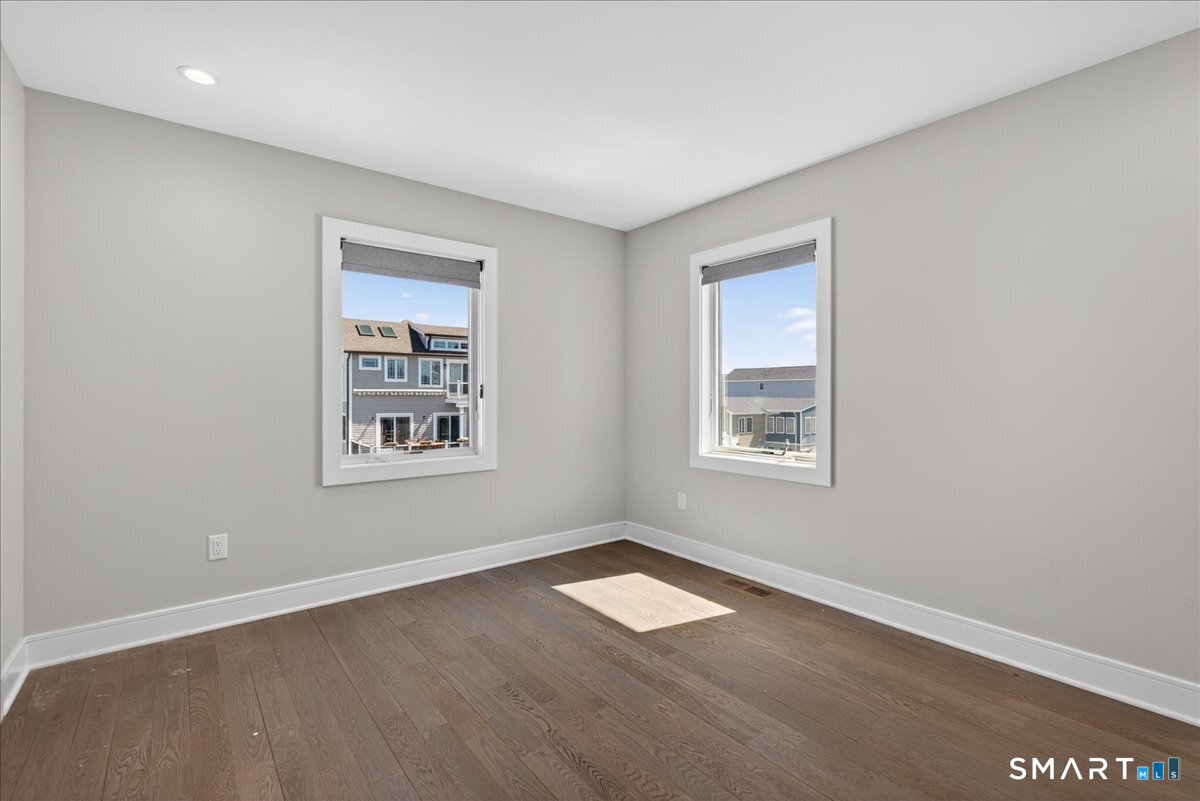 33 Pearl Street Milford, CT 06460 - Photo 26 of 40 an empty room with a window