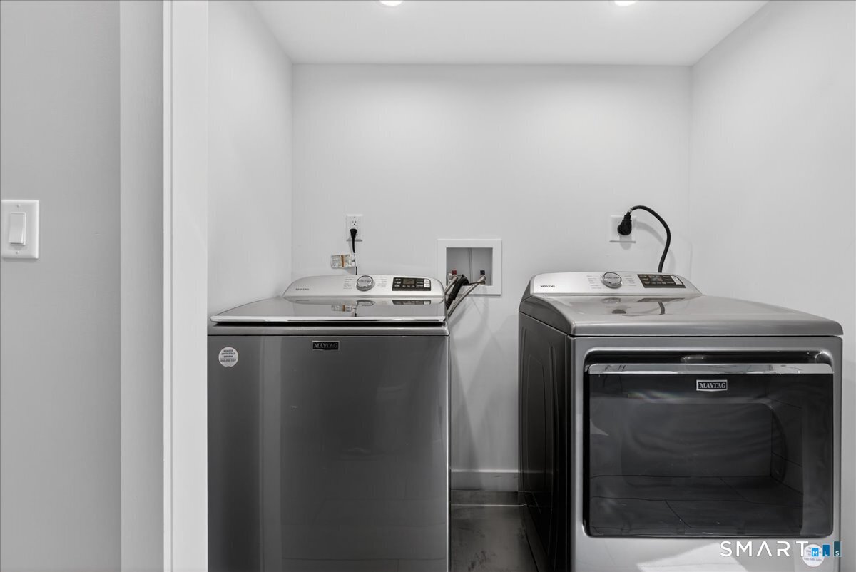33 Pearl Street Milford, CT 06460 - Photo 29 of 40 a utility room with dryer and washer