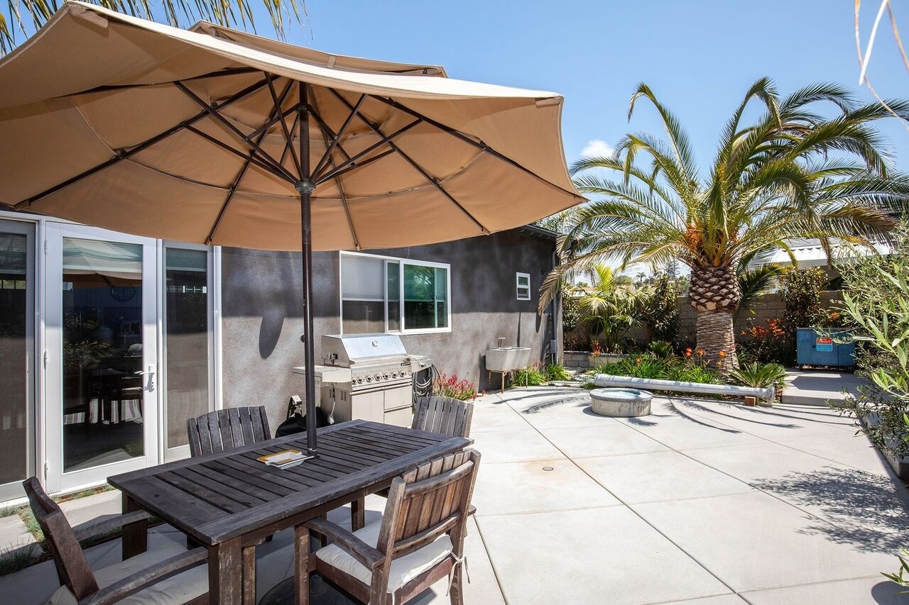 731 North Vulcan Avenue Encinitas, CA 92024 - Photo 13 of 25 Shared back patio area with fire pit and barbecue area.