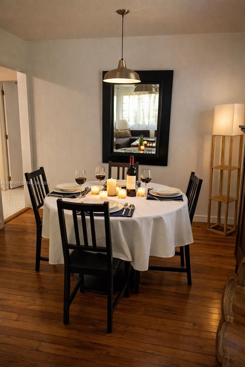 5800 Southwest 61st Street Miami, FL 33143 - Photo 4 of 23 a dining room with furniture and wooden floor
