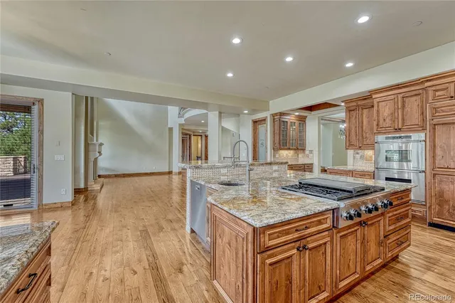 a view of entryway and hall with a front door