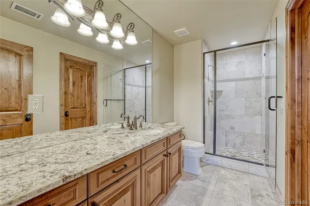 a view of a balcony with wooden floor
