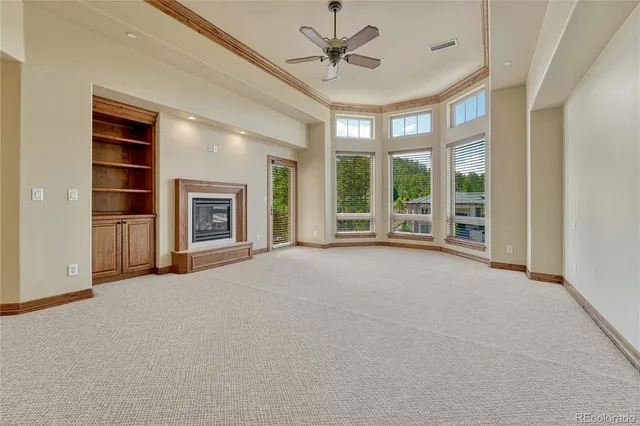 a front view of a house with a garage