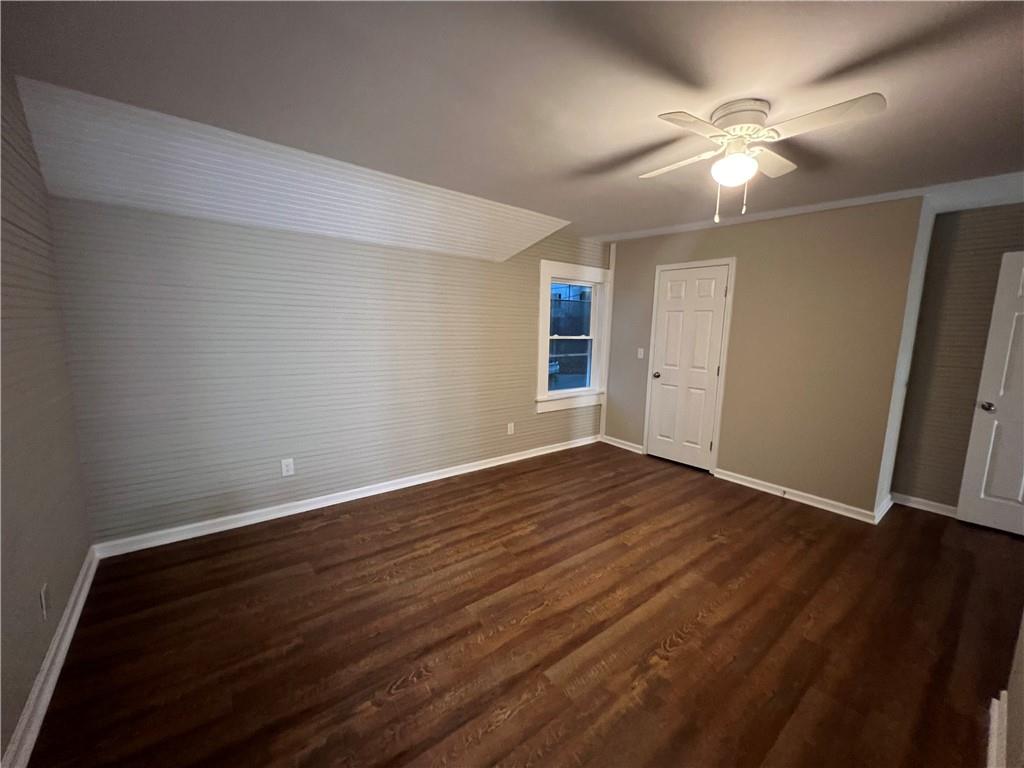 15 Tower Street Gainesville, GA 30501 - Photo 7 of 9 an empty room with wooden floor and window
