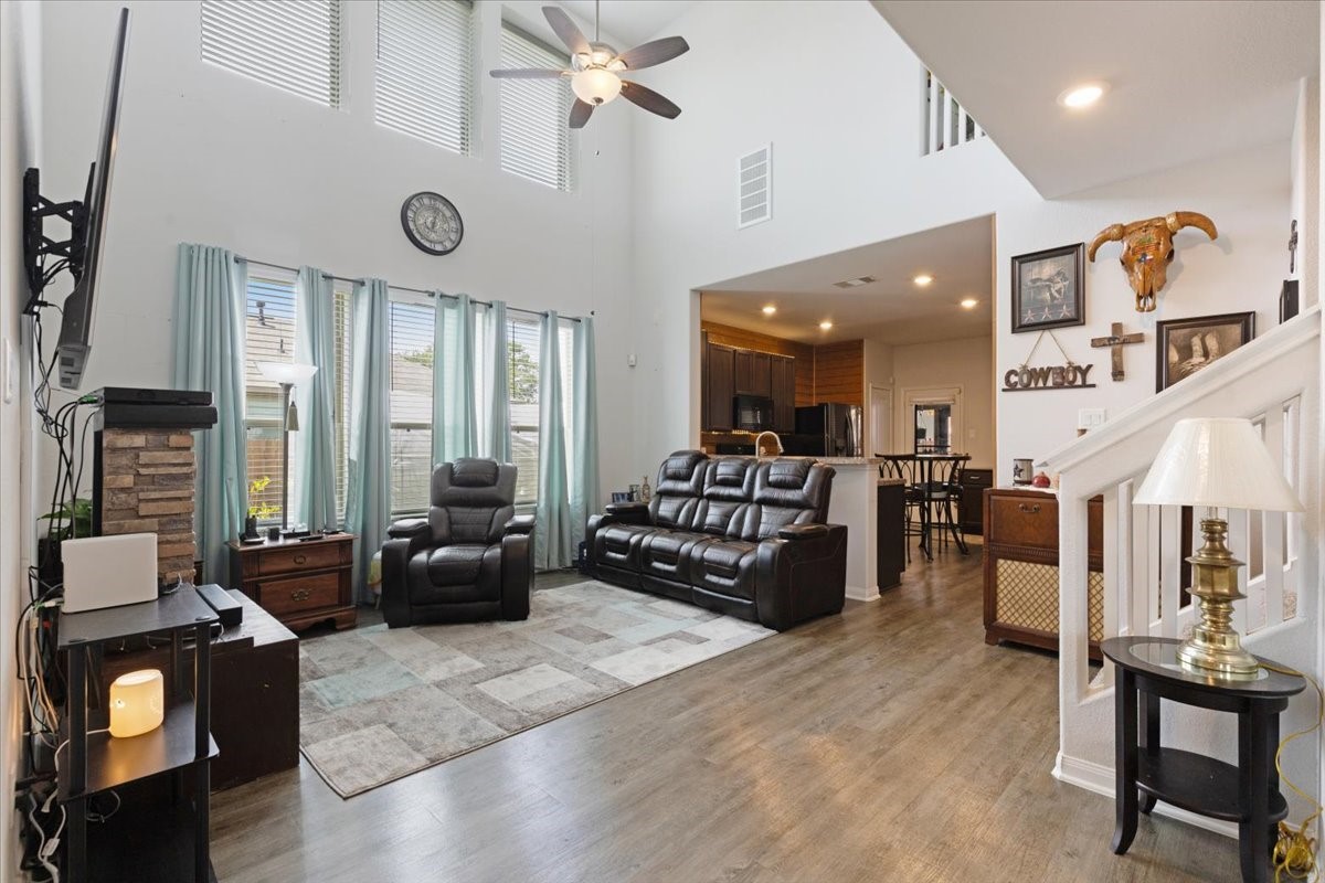 1685 County Road 5102 East Cleveland, TX 77327 - Photo 6 of 31 a living room with furniture and a large window