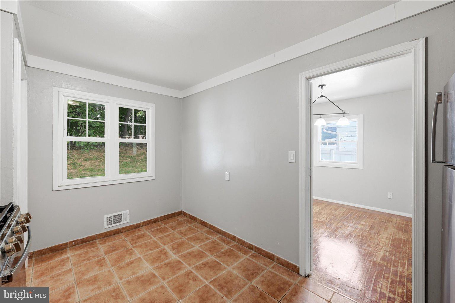 9110 Meadow Heights Road Randallstown, MD 21133 - Photo 16 of 39 Bright and airy kitchen space.