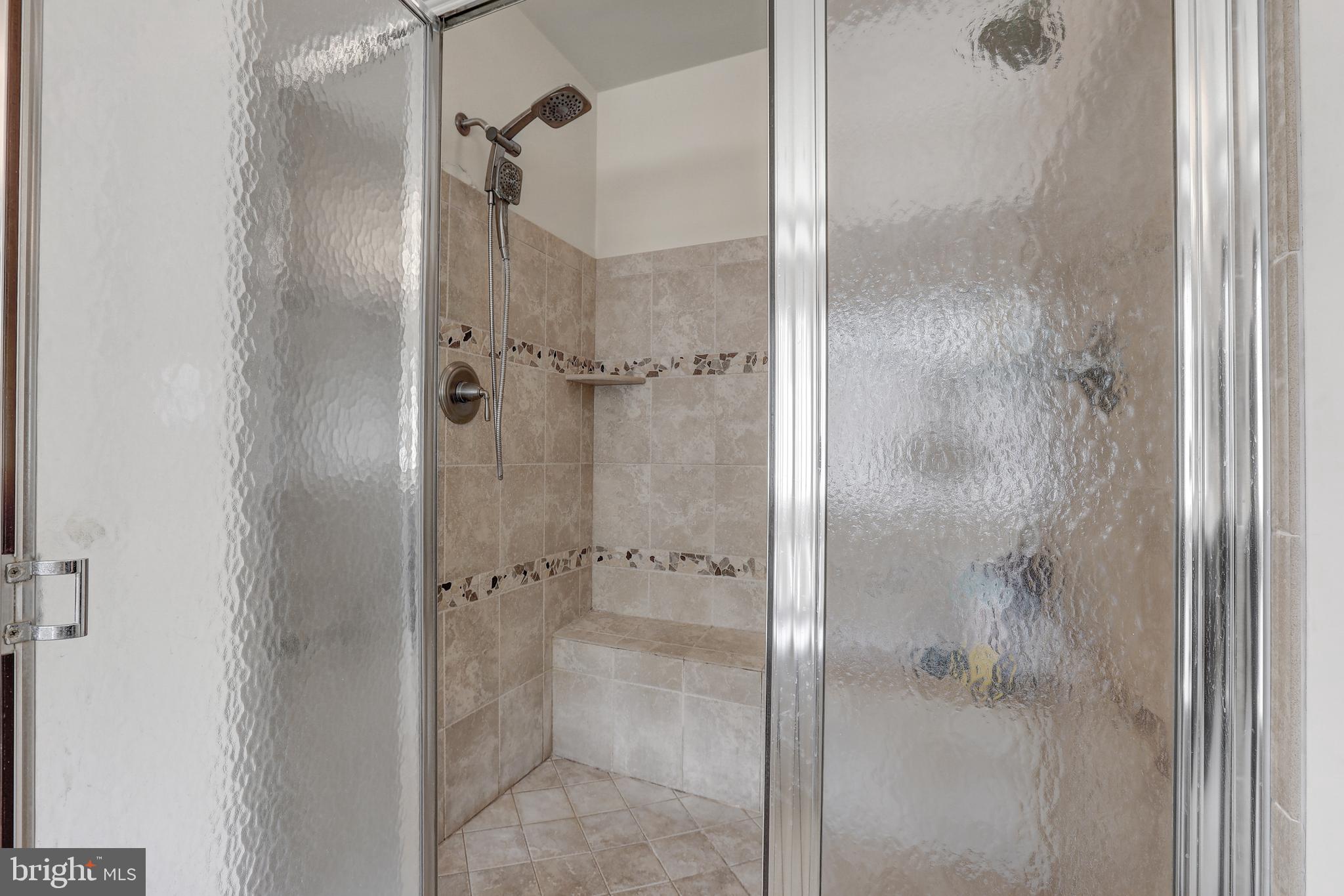 1601 Rushing Stream Court Forest Hill, MD 21050 - Photo 44 of 72 Walk-in Shower with accent tile & built-in bench