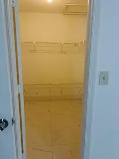 a view of door next to a window