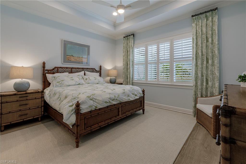 5906 Haiti Drive Naples, FL 34113 - Photo 16 of 44 a bedroom with a bed and a window